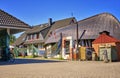 Fisherman's house with bicycle and fishing net at the harbor. Weisse Wiek in Boltenhagen on the Baltic Sea. Germany